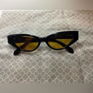 Poppy Lissiman sunglasses